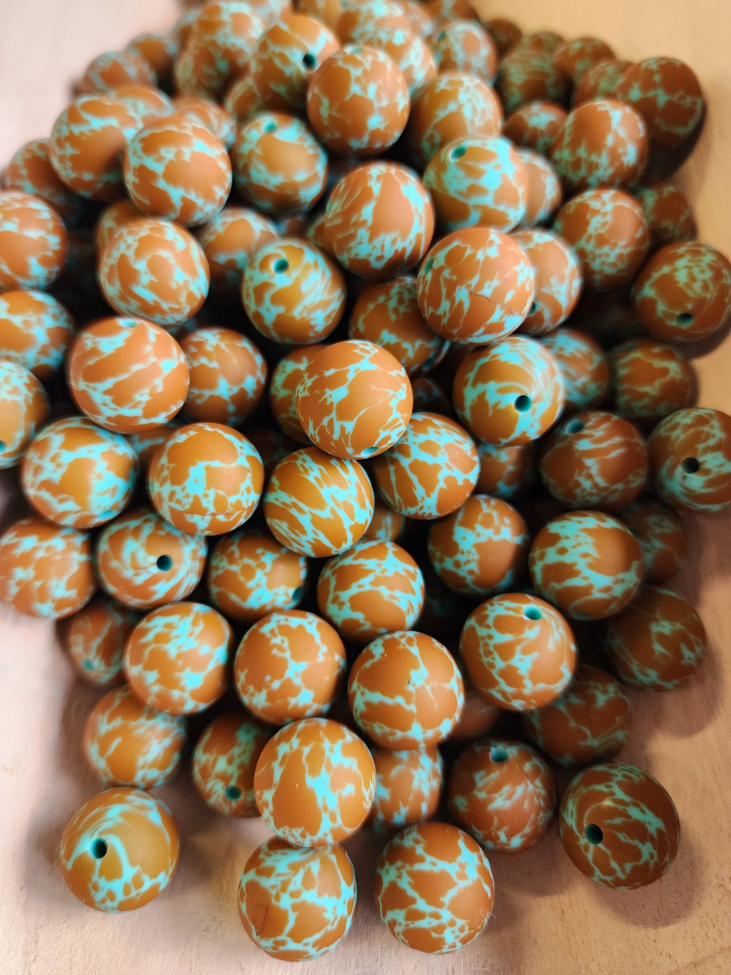 Custom rust on turquoise cowprint