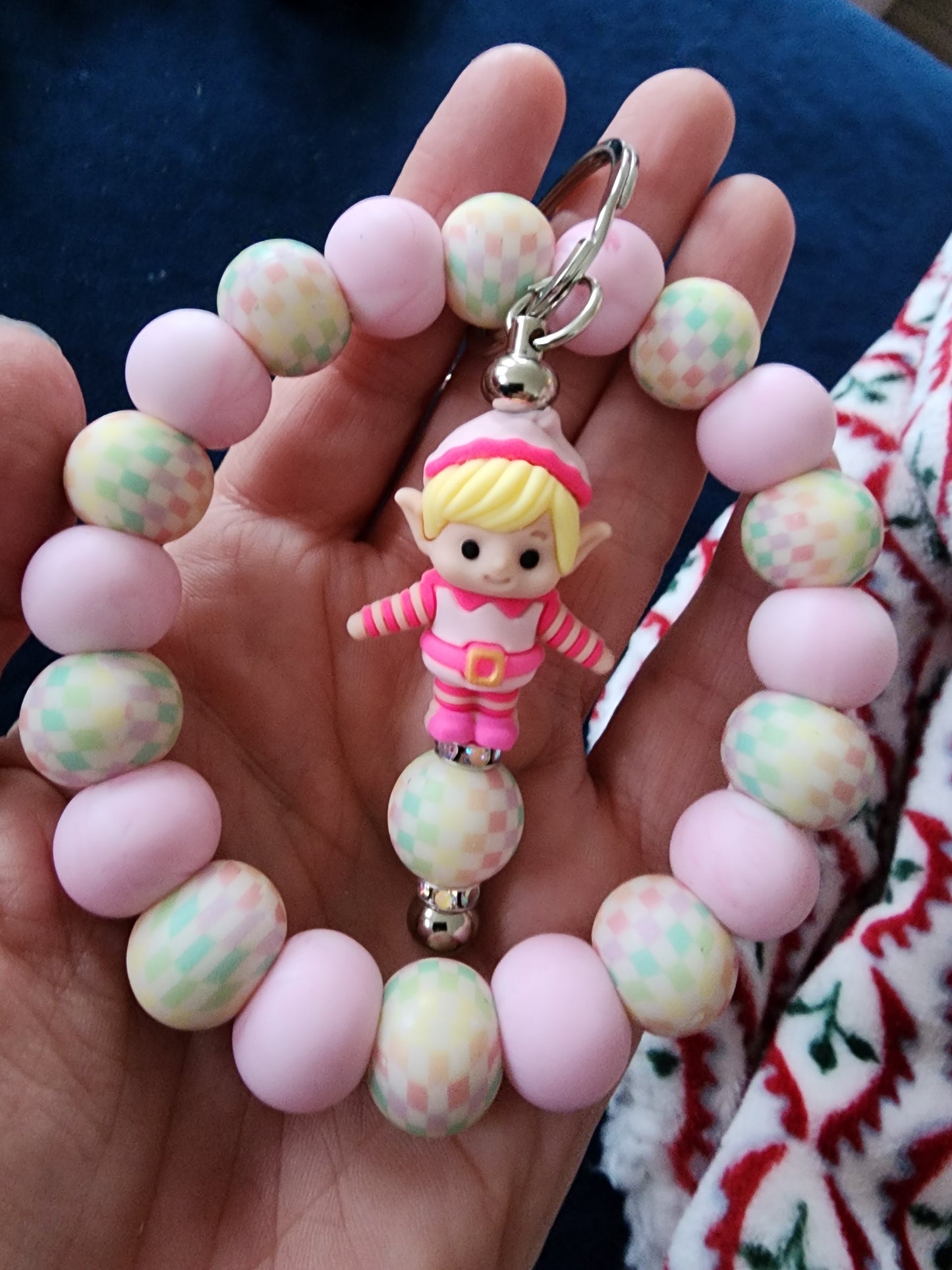 Green guy and pink elf silicone wristlet keys