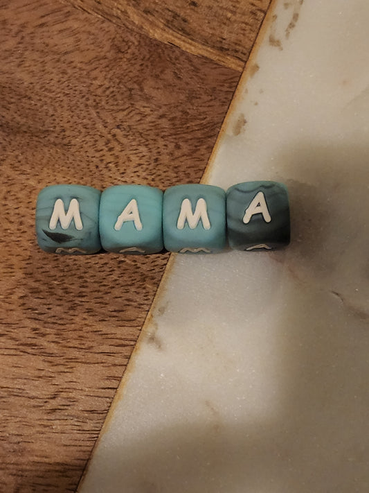 Signature Turquoise swirl letters MAMA